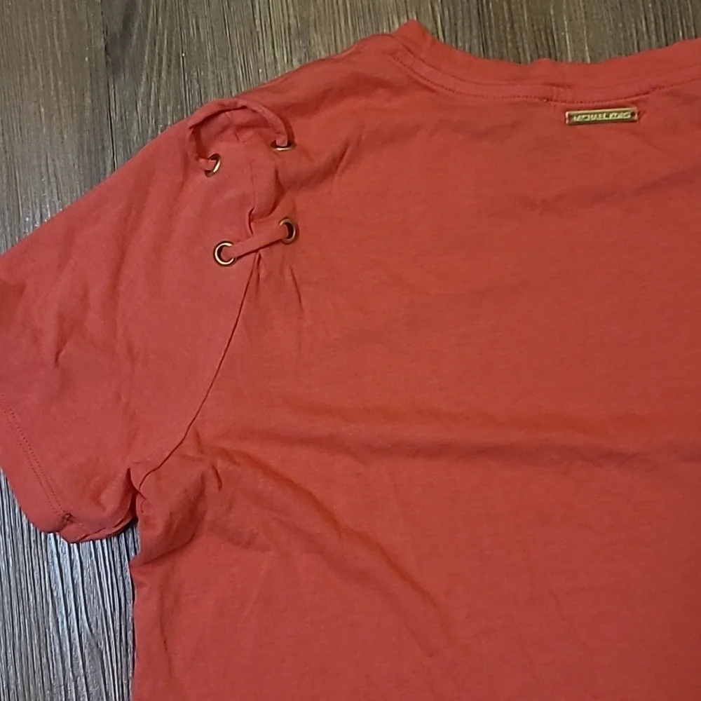 Michael Kors Orange Short Sleeve Top with Lace-Up Detail used good condition‎